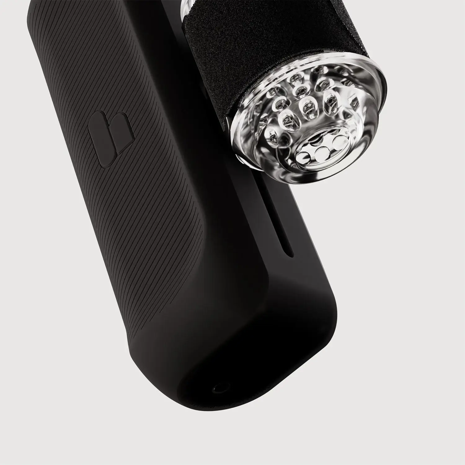 The Handy 2 Pro underside close-up with transparent sleeve detail