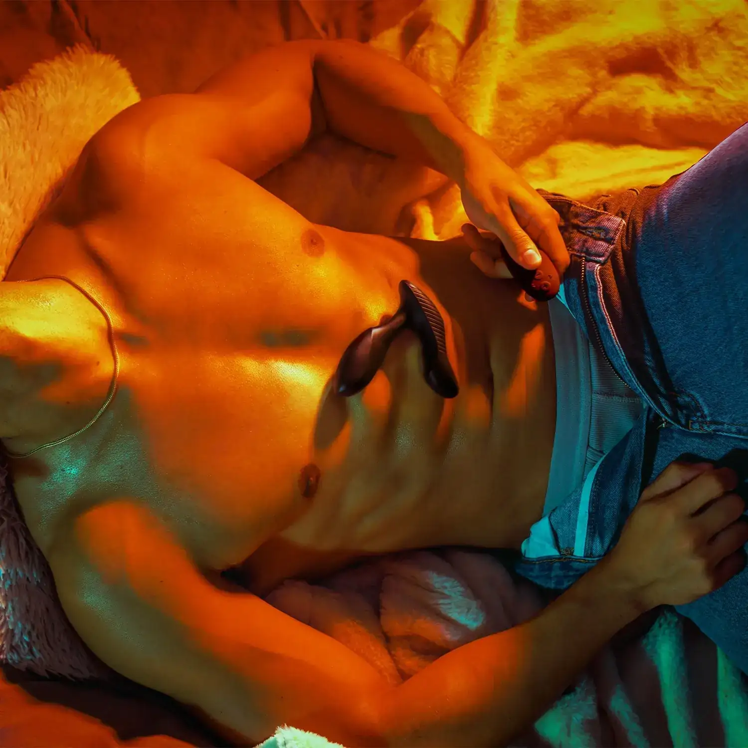 Man using Arcwave Perk black prostate vibrator with remote in hand